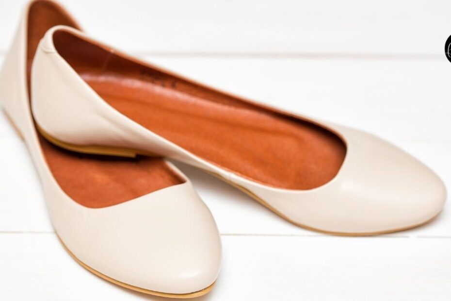 Cream wide flats on white background