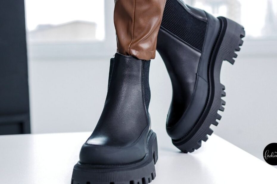 Black Chelsea boots with lug soles